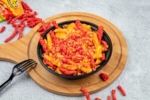 FRIES WITH HERO BURGER SOUSE AND CHEETOS