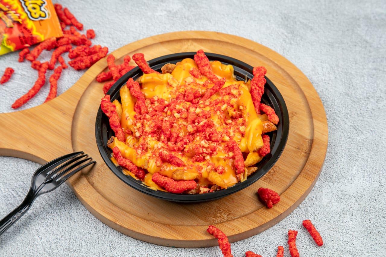 FRIES WITH HERO BURGER SOUSE AND CHEETOS